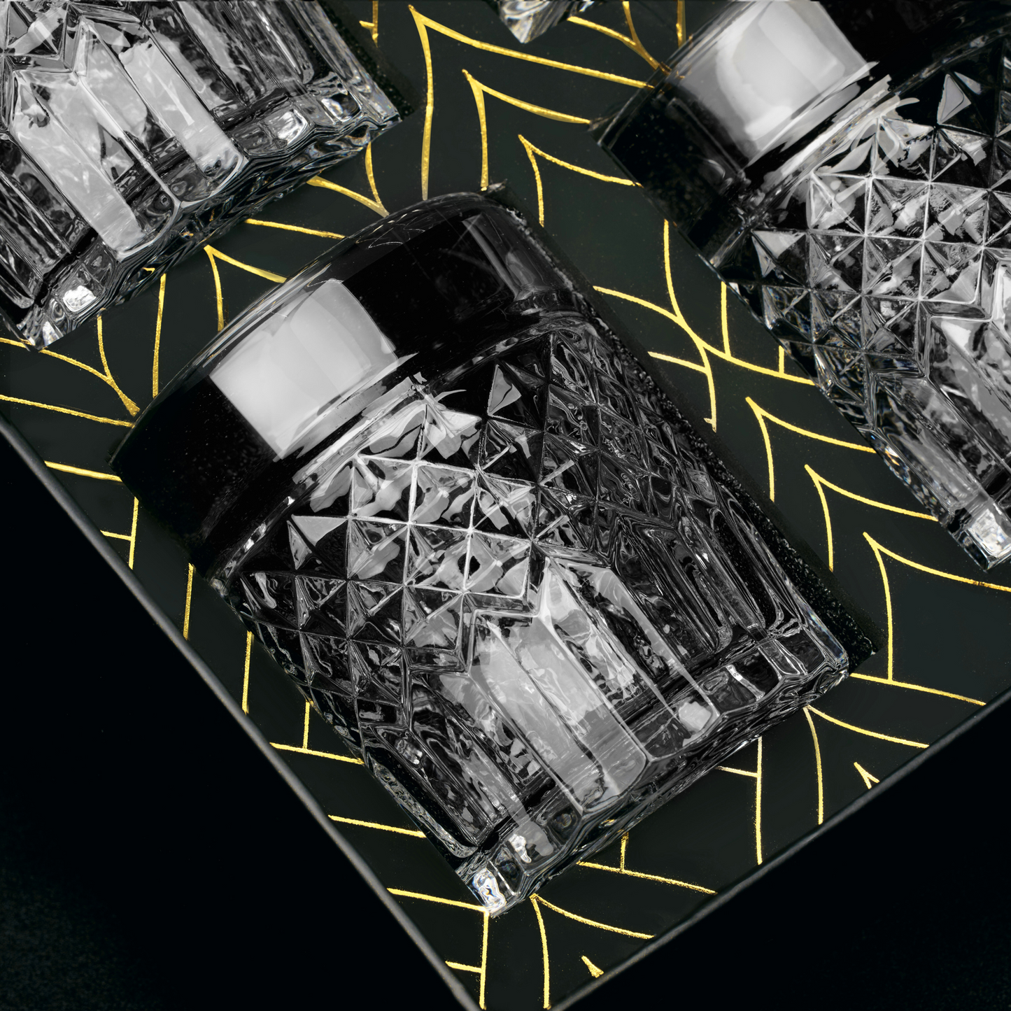 Prestige whiskey glass privilege collection — high-end gift set for dad who drinks scotch Crystal glassware on a black surface with yellow patterns