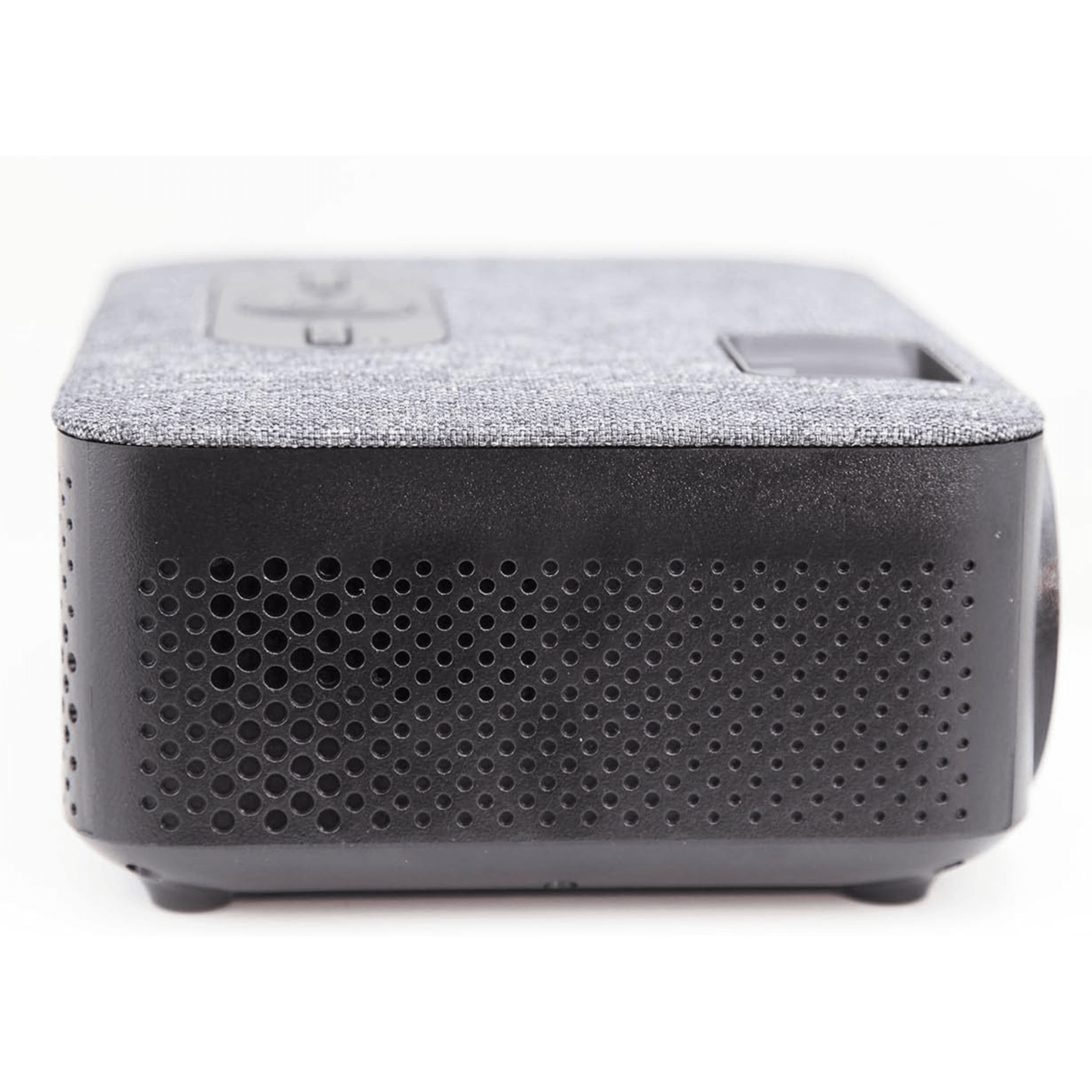 Black electronic device with textured top and perforated bottom on a white background tech gift for dad who loves movies