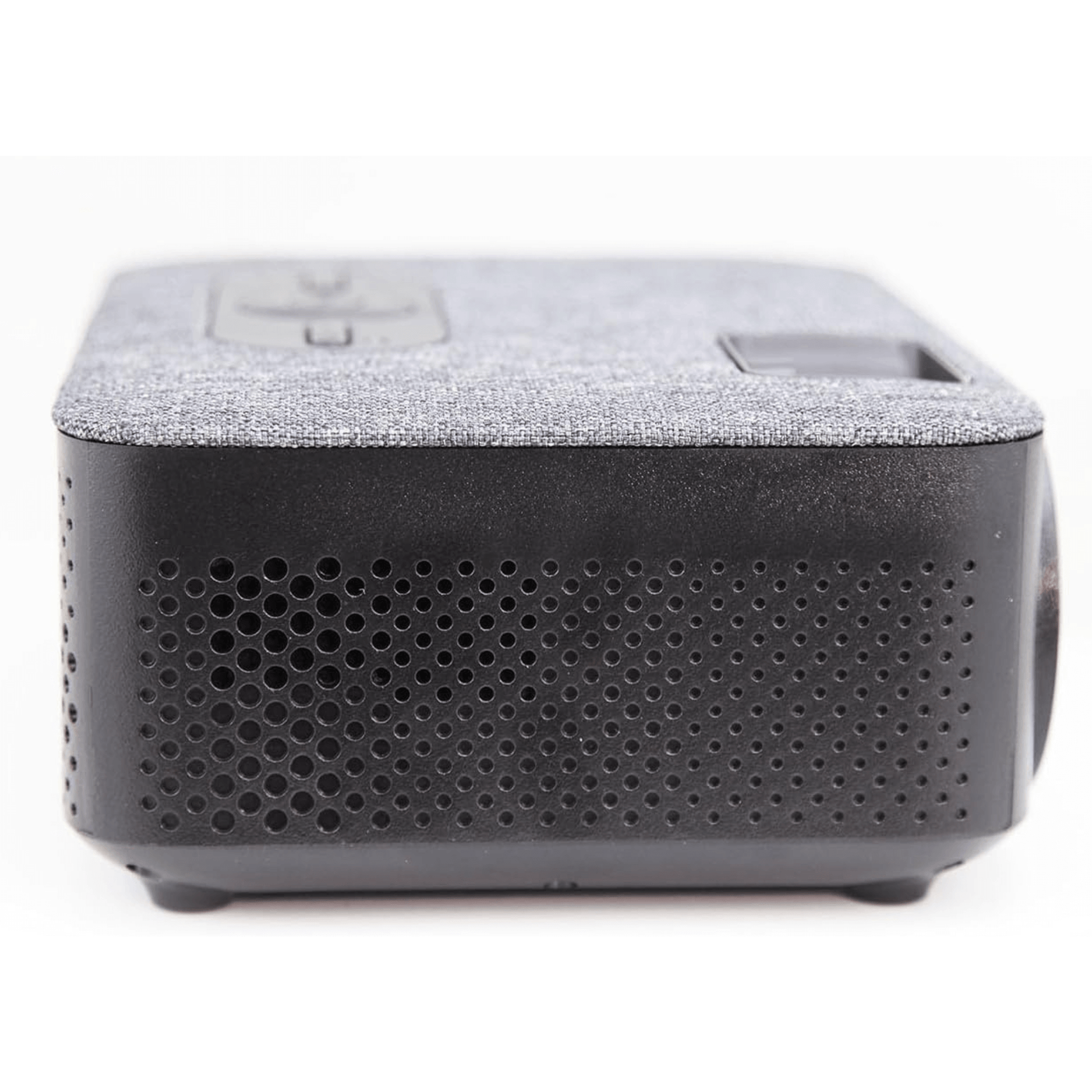 Black electronic device with textured top and perforated bottom on a white background tech gift for dad who loves movies