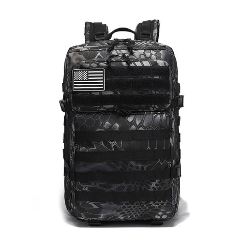 Tactical backpack in black python snake-scale print pattern, front view on white background