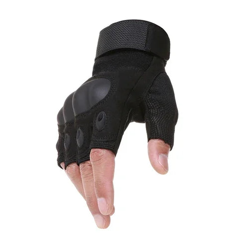 Tactical half-finger gloves in black worn on a hand with fingers extended, white background