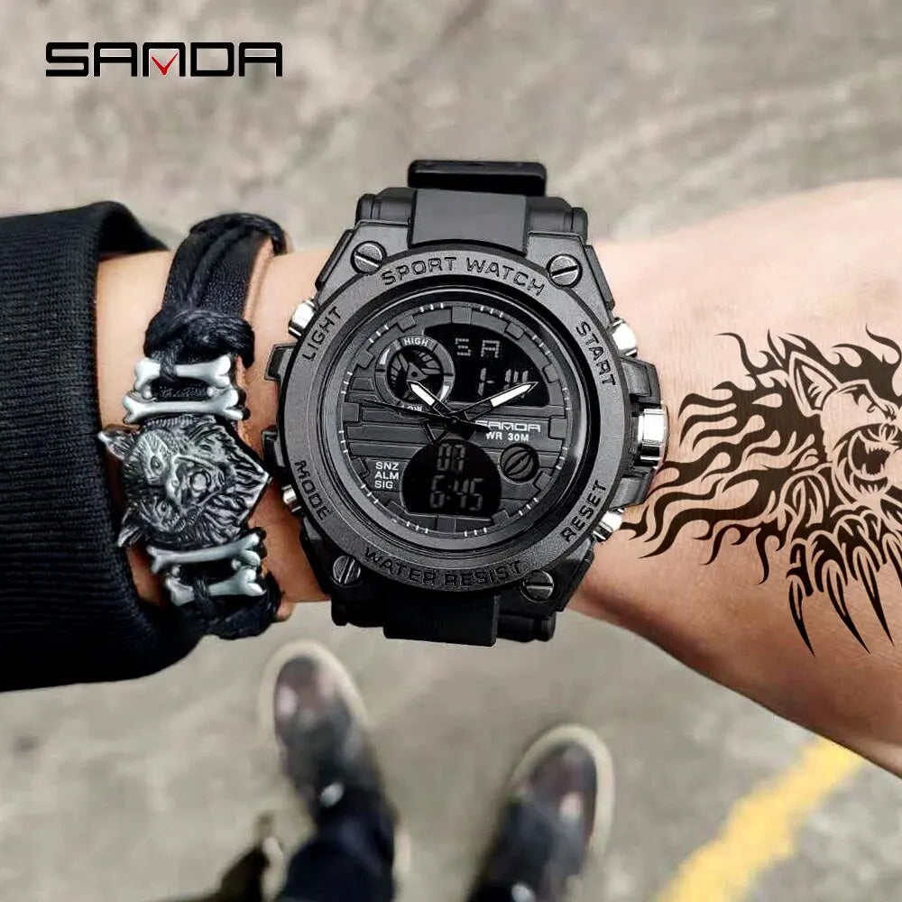 Military sport watch worn on a tattooed wrist, lifestyle shot in an urban outdoor setting