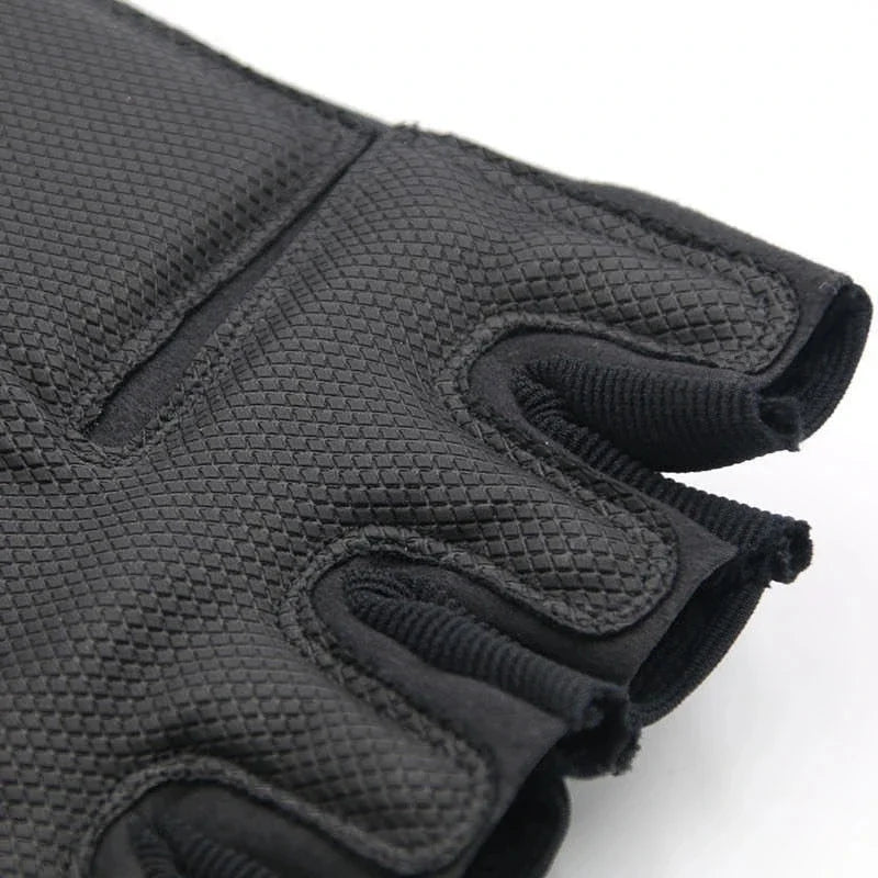 Tactical half-finger gloves close-up of black textured mesh fabric on the back of the hand