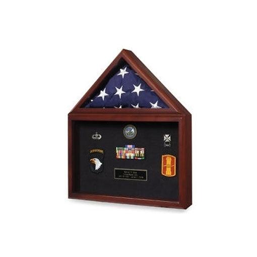 Flag and medal display case holding a folded American flag and military medals in a cherry wood shadow box